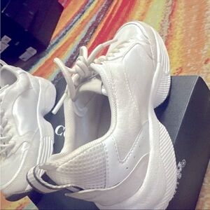 COACH signature tennis shoe.  Worn very few times.